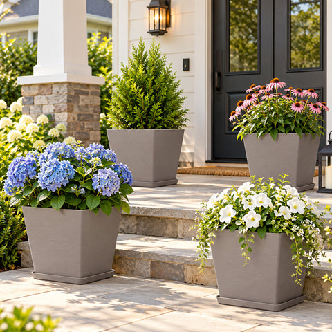 Kozyard large square outdoor planters with matching saucers showcase hydrangeas, flowering plants and greenery around a welcoming front porch and entryway. These modern decorative flower pots offer spacious planting room for medium to large plants and complement porch, patio, deck, garden and front door decor, making them versatile indoor outdoor planters for seasonal flowers and landscaping.