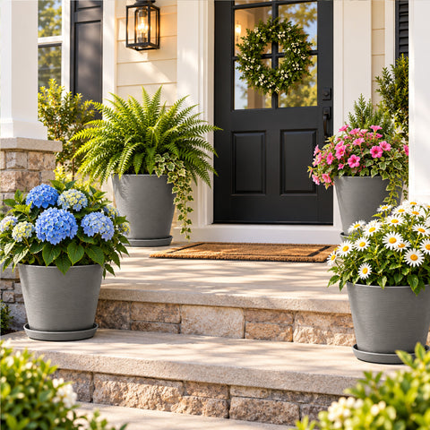 Kozyard large outdoor planters with matching saucers display hydrangeas, coneflowers, daisies, mums and ferns on a sunny front porch. These modern flower pots provide stylish containers for medium to large plants and seasonal flowers, making them ideal outdoor planters for porch, patio, garden, entryway, deck and landscaping decor while adding a clean contemporary look.