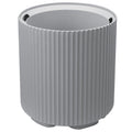 This is a gray plastic planter pot with a cylindrical shape. The exterior of the pot features vertical ribbed patterns, adding a textured and stylish look. The top edge of the pot has cut - out sections, likely for easy handling. The interior of the pot is empty, ready for planting. Stylish Gray Plastic Planter Pot with Ribbed Design. gray plastic planter, ribbed planter pot, cylindrical planter, plastic planting pot, decorative planter