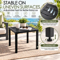 Kozyard black metal outdoor side table with slatted tabletop and adjustable feet for improved stability on uneven patio, balcony, porch and deck surfaces. Durable weather-resistant construction, easy-clean finish and drainage-friendly slat design make this compact patio end table ideal for outdoor seating areas, gardens and poolside spaces in changing weather conditions.