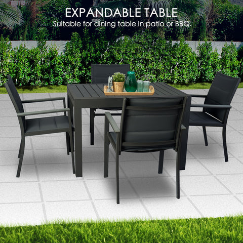Kozyard Outdoor Dining Set Introduction: Features aluminum-framed table & chairs with weather-resistant fabric. Its minimalist design fits patios, gardens or terraces, ideal for outdoor meals, casual gatherings or relaxed coffee breaks with family and friends.