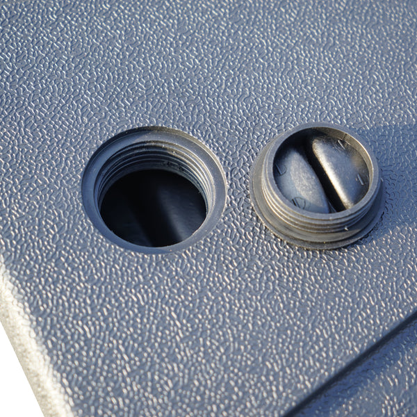 Umbrella Hole and Plug for Outdoor Table
A close - up of an outdoor table's surface showing an umbrella hole and its matching plug, designed for use with patio umbrellas. Keywords: umbrella hole, table plug, outdoor table