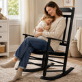 Senior woman relaxing with coffee on Kozyard white solid wood porch rocker, ergonomic garden rocking chair for lawn and deck.