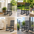 Senior woman relaxing with coffee on Kozyard white solid wood porch rocker, ergonomic garden rocking chair for lawn and deck.