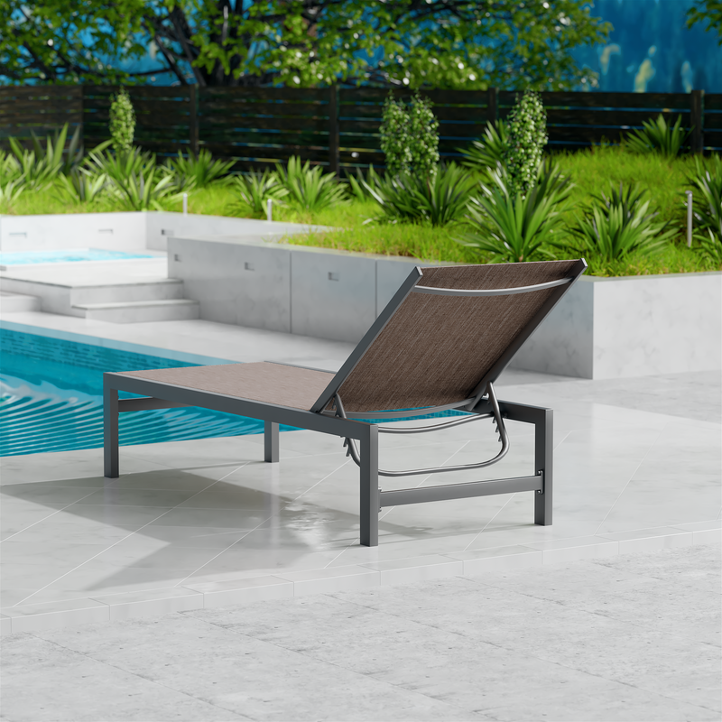 A beige outdoor lounge chair with a dark frame is set on a sleek, light - colored tiled area beside a swimming pool. The background features lush greenery and a wooden fence, creating a serene outdoor relaxation spot.
Beige Outdoor Lounge Chair: Relax in Style by the Pool. beige outdoor lounge chair, poolside lounge chair, outdoor relaxation furniture, dark - framed lounge chair.