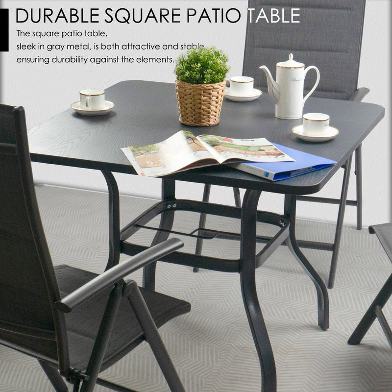 A square outdoor patio table in sleek gray metal, accompanied by matching folding chairs. The table is set with a small potted plant, a tea set, and an open magazine, creating a cozy outdoor - dining or relaxing atmosphere. The text "DURABLE SQUARE PATIO TABLE" highlights the table's durability and stylish design.Durable and Stylish Outdoor Patio Table and Chair Set.outdoor patio table, folding chairs, durable patio furniture, gray metal table, outdoor dining set.