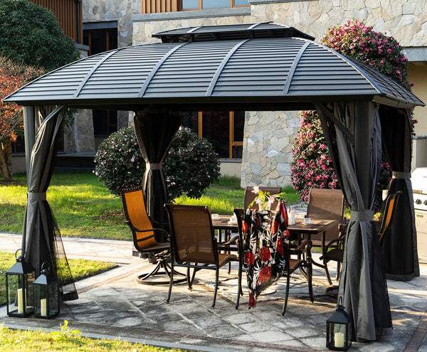 Outdoor Patio Gazebo with Furniture Setup
A black outdoor patio gazebo with a slatted roof and draped curtains, featuring a dining table and chairs set, surrounded by greenery and decorative elements like lanterns. Keywords: outdoor patio gazebo, outdoor dining setup, decorative elements