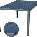 A rectangular outdoor dining table with a grey metal frame and a dark blue composite wood - like tabletop. The close - up inset shows the texture of the slatted tabletop, highlighting its durable and stylish design. Rectangular Outdoor Dining Table with Grey Frame and Composite Wood Top. rectangular dining table, outdoor table, grey frame, composite wood tabletop, slatted design.
