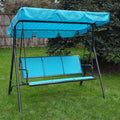 A blue-colored outdoor swing chair set on a lush green lawn. The swing features a canopy of the same blue hue, providing shade. The seating area is composed of blue fabric panels, and a decorative patterned pillow adds a touch of style. The chair has a sturdy black metal frame, making it a cozy spot for relaxation in the garden. Blue Outdoor Swing Chair for Garden Relaxation.
Blue Outdoor Swing Chair for Garden Relaxation