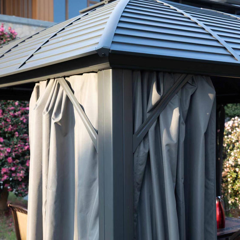 Kozyard Odyssey 10'x12' Hardtop Aluminum Permanent Gazebo with a Mosquito Net Sidewall and Privacy Wall (Odyssey 10'x12')