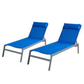 Title: Blue Outdoor Lounge Chairs Set of Two
Alt Text: Two blue outdoor lounge chairs with cushioned headrests, isolated on a white background.
Keywords: blue lounge chairs, outdoor furniture, patio seating, cushioned headrests, modern design, relaxation, poolside chairs
