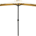 A beige - colored outdoor full - sized umbrella with a black pole. The umbrella is fully open, showcasing its wide canopy and the mechanism on the pole for operation. Elegant Outdoor Beige - Colored Sunshade Umbrella. outdoor sunshade umbrella, beige - colored canopy, black pole, patio umbrella