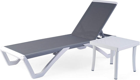 A modern outdoor lounge set featuring a sleek, adjustable lounge bed with a gray fabric surface and a matching white - framed side table. The lounge bed has a contemporary design with angular white legs, and the side table provides a convenient surface for placing items. Contemporary Outdoor Lounge Bed with Side Table. outdoor lounge bed, side table, adjustable backrest, gray fabric, modern design