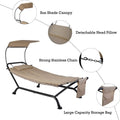 An infographic of an outdoor hammock - style lounger with key features labeled. The lounger has a beige fabric bed with fringed edges, a black metal frame, and is equipped with a sun shade canopy, a detachable head pillow, a strong stainless chain, and a large - capacity storage bag.Outdoor Hammock Lounger: Feature - Rich Relaxation Solution. outdoor hammock lounger, sun shade canopy, detachable head pillow, stainless chain, large - capacity storage bag.