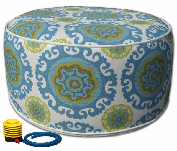 Inflatable Outdoor Ottoman with Decorative Cover
An inflatable outdoor ottoman featuring a decorative cover with a blue and green floral pattern, accompanied by an air pump for inflation. Ideal for adding comfort and style to outdoor spaces.
