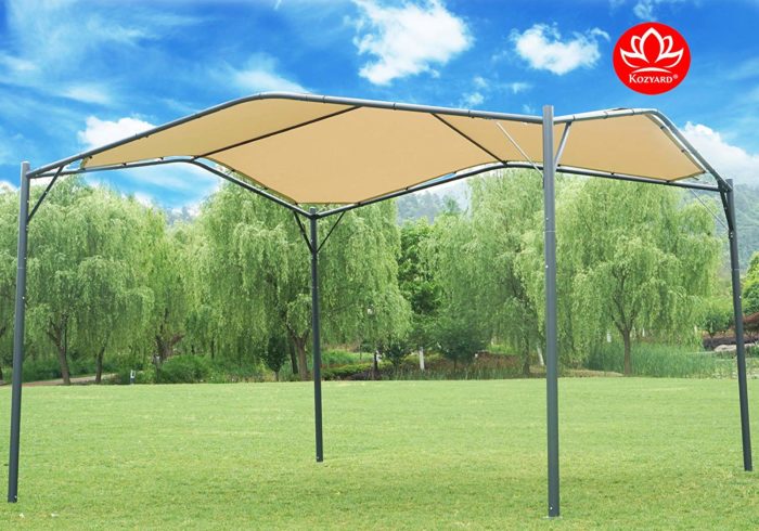 A Sun Shade Gazebo by KOZYARD is set against a picturesque outdoor backdrop of a grassy field and willow trees under a partly cloudy sky. The gazebo features a tan - colored canopy supported by dark metal poles, providing a shaded spot for outdoor relaxation.KOZYARD Sun Shade Gazebo for Outdoor Relaxation.KOZYARD sun shade gazebo, outdoor shade structure, tan canopy, metal - framed gazebo, relaxation spot.