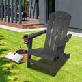 Gray Adirondack Chair for Outdoor Leisure
alt text：A gray Adirondack chair with a cup holder, placed on a grassy area, accompanied by a book, a slice of cake, and a drink, perfect for outdoor relaxation. Keywords: gray Adirondack chair, outdoor leisure, cup holder