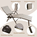 A beige foldable lounge chair with multiple convenient features. It comes with an ergonomic pillow for comfort, a detachable cup tray for holding drinks, and has durable connections. The chair can be easily folded for portability, thanks to its folding legs.Beige Foldable Lounge Chair with Convenient Features. beige foldable lounge chair, ergonomic pillow, detachable cup tray, durable connection, folding legs, portable lounge chair.