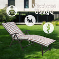 A foldable lounge chair with beige-and-white striped cushions, suitable for various uses. The chair comes with a side cup-holder, and can be used for reading, relaxing with a drink, or simply unwinding. It is set in a pleasant outdoor environment, highlighting its versatility for outdoor leisure. foldable lounge chair, beige-and-white striped cushions, side cup-holder, multiple uses, outdoor leisure.