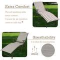 A foldable lounge chair with beige-and-white striped cushions offers extra comfort with its soft padding, suitable for use in air-conditioned rooms or on cold days. The chair without cushions shows its breathable fabric, ideal for summertime. It also features a side cup-holder for convenience. foldable lounge chair, beige-and-white striped cushions, extra comfort, breathable fabric, side cup-holder.