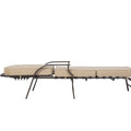 Contemporary Outdoor Lounge Chair
alt text：A modern outdoor lounge chair with a sleek metal frame and beige cushions, designed for comfort and relaxation. Keywords: outdoor lounge chair, metal frame, beige cushions
