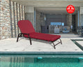 Stylish Red Outdoor Lounge Chair by Kozyard
alt text：A vibrant red outdoor lounge chair by Kozyard, positioned by a pool with a modern indoor living space in the background. Keywords: Kozyard lounge chair, red outdoor furniture, poolside
