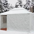 Title: Winter Gazebo Cover in Snowy Forest - Durable Outdoor Protection
Alt Text: White winter gazebo cover set up in a snowy forest, protecting against harsh weather with rolled-up window flaps.
Keywords: winter gazebo cover, snowy forest gazebo, outdoor winter protection, durable gazebo cover, winter camping shelter, snow-resistant gazebo, outdoor gazebo accessories