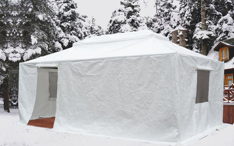 Title: Winter Gazebo Cover in Snowy Forest - Durable Outdoor Protection
Alt Text: White winter gazebo cover set up in a snowy forest, protecting against harsh weather with rolled-up window flaps.
Keywords: winter gazebo cover, snowy forest gazebo, outdoor winter protection, durable gazebo cover, winter camping shelter, snow-resistant gazebo, outdoor gazebo accessories