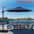 A navy blue cantilever patio umbrella set up on a wooden deck overlooking the lake. Note: Counter weight is required and not included in the package.
Outdoor offset umbrella providing shade near wicker chairs by the lake side. Counter weight needed, not part of the package. Lake side Cantilever Umbrella: Counter Weight Not Included. Ocean - View Patio Umbrella: Counter Weight Required. cantilever umbrella, patio umbrella, outdoor umbrella, seaside umbrella, counter weight, wicker chairs, lake - view