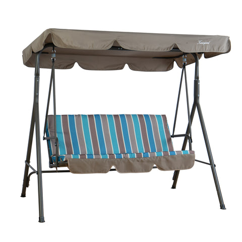 An outdoor swing chair by Kozyard with a robust metal frame. It features a beige canopy providing shade, and the seat is upholstered with a cushion that has a vibrant striped pattern in shades of blue, teal, and brown. There is also a matching footrest area with a beige cover. Kozyard Outdoor Swing Chair: Colorful Comfort for Your Patio. Kozyard swing chair, outdoor patio swing, striped - cushion swing chair, swing with canopy, comfortable outdoor seating.