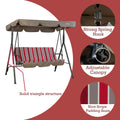 This image highlights a Kozyard outdoor swing chair. It features a solid triangle structure for enhanced stability. The swing is equipped with a strong spring hook for secure hanging and an adjustable canopy for customizable shade. The seating area is covered with a nice striped padding, adding both comfort and a stylish look. Kozyard Outdoor Swing Chair: Stability, Comfort, and Style. Kozyard swing chair, outdoor swing, solid triangle structure, adjustable canopy swing, striped - cushion swing.