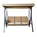 A beige - colored outdoor swing chair by Kozyard. The swing features a sturdy black metal frame, a canopy for shade, and a three - seater bench with beige fabric. It's a comfortable and stylish piece of outdoor furniture ideal for relaxation.Kozyard Beige Outdoor Swing Chair for Relaxing. Kozyard swing chair, outdoor swing, beige swing, black metal frame, outdoor relaxation.