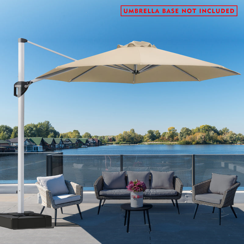 A stylish outdoor offset umbrella in beige provides shade over a picnic table on a deck with a stunning lake and mountain backdrop. The umbrella is mounted on a base, but a notice in red text states "UMBRELLA BASE NOT INCLUDED". The deck has additional white benches, and the overall setting is bright and inviting.
Beige Cantilever Patio Umbrella: Scenic Outdoor Shade, Base Not Included
Outdoor Offset Umbrella: Enjoy the View, Base Not Included.
cantilever patio umbrella, offset umbrella, beige umbrella