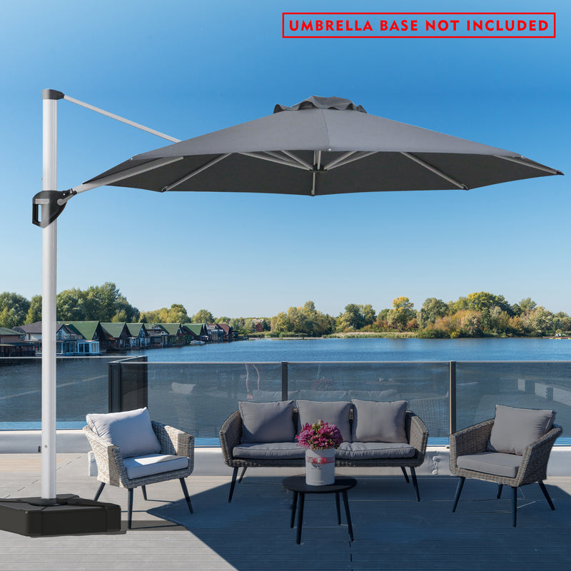 A stylish outdoor offset umbrella in gray provides shade over a picnic table on a deck with a stunning lake and mountain backdrop. The umbrella is mounted on a base, but a notice in red text states "UMBRELLA BASE NOT INCLUDED". The deck has additional white benches, and the overall setting is bright and inviting.
Gray Cantilever Patio Umbrella: Scenic Outdoor Shade, Base Not Included
Outdoor Offset Umbrella: Enjoy the View, Base Not Included.
cantilever patio umbrella, offset umbrella, gray umbrella