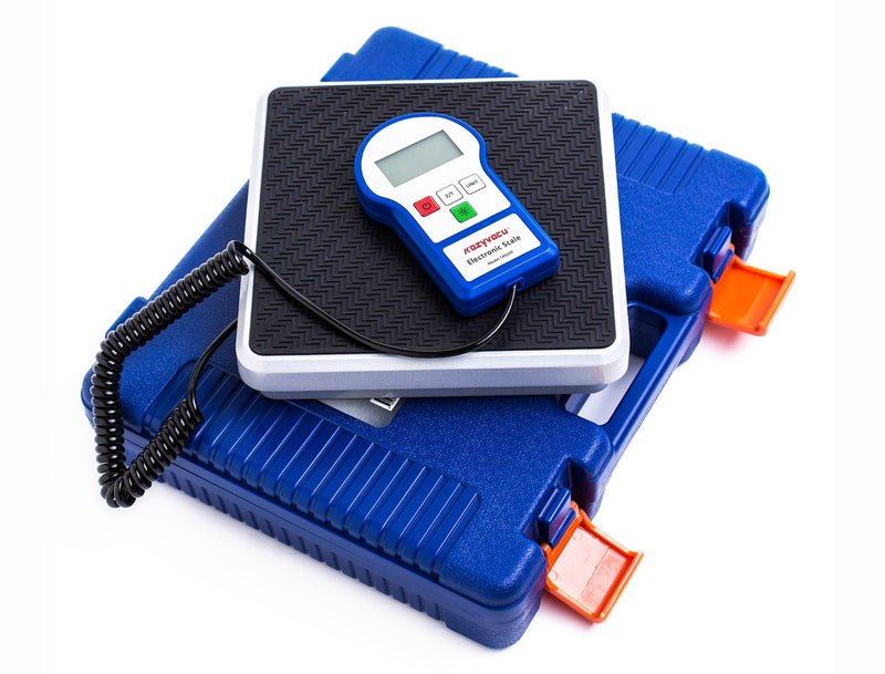 Title: Kozyvacu TAS100 Electronic Scale with Carrying Case
Alt Text: Kozyvacu TAS100 Electronic Scale on blue carrying case, featuring a digital display and coiled cable for HVAC use.
Keywords: Kozyvacu, TAS100, electronic scale, HVAC tool, refrigerant scale, carrying case, digital weighing
