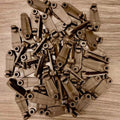 Bulk Brown Plastic Hooks for gazebo curtain– Durable Hardware for Fence and Gate Latches. A large pile of brown plastic hooks, designed for fencing, gates, and latch systems. Weather-resistant and durable for outdoor use.