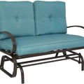 A glider chair with a blue cushioned seat and backrest. The chair features a sturdy metal frame with curved armrests and a slatted lower frame, designed for comfortable outdoor or indoor relaxation. glider chair, blue cushion, metal frame, curved armrests, relaxation.