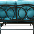 A glider bench with vibrant blue cushions, featuring an elegant black metal frame with circular cut - out designs on the backrest. The bench is designed for a smooth gliding motion, providing a comfortable and stylish seating option for outdoor spaces. Blue - Cushioned Glider Bench with Circular Design. blue - cushioned glider bench, black metal frame, circular backrest design, smooth gliding motion, outdoor seating.