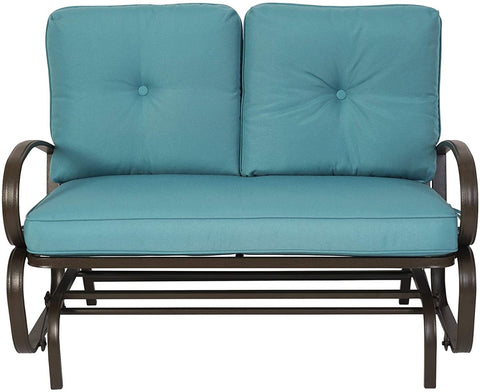A glider chair with a blue cushioned seat and backrest. The chair features a sturdy metal frame with curved armrests and a slatted lower frame, designed for comfortable outdoor or indoor relaxation. glider chair, blue cushion, metal frame, curved armrests, relaxation.