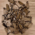 Bulk Brown Plastic Hooks for gazebo curtain– Durable Hardware for Fence and Gate Latches. A large pile of brown plastic hooks, designed for fencing, gates, and latch systems. Weather-resistant and durable for outdoor use.