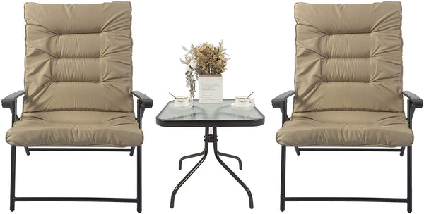 A set of beige folding chairs with padded seats and backs, paired with a small glass - topped folding table. The table is decorated with a dried flower arrangement, coffee cups, enhancing the aesthetic of this outdoor seating set. Beige Folding Chair Set: Outdoor Comfort & Style. folding chair sets, beige color, outdoor seating, padded chairs.