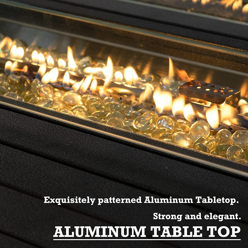 A close - up view of the flame area of an outdoor fire pit table, showcasing golden - hued glass beads amidst the flames. The text below highlights that the tabletop is made of exquisitely patterned aluminum, emphasizing its strength and elegance. Elegant Aluminum - Topped Outdoor Fire Pit Table . outdoor fire pit table, aluminum tabletop, glass beads fire pit, elegant patio furniture, strong fire pit
