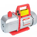 "Alt text: A Kozyvacu TA350 1-stage vacuum pump with a red handle and base, featuring a metallic body, oil sight glass, and warning label, placed against a white background. vacuum pump, Kozyvacu TA350, 1-stage pump, HVAC tool, refrigeration equipment, oil sight glass, red handle, industrial pump, air conditioning repair, maintenance tool."