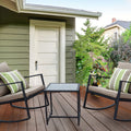 Serene Backyard Rocking Chair Ensemble
alt text：A tranquil outdoor setting featuring two rocking chairs with plush cushions, a small table, set on a wooden deck by a house, surrounded by lush greenery. Ideal for relaxation. Keywords: backyard rocking chairs, outdoor seating, deck decor