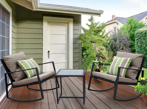 Serene Backyard Rocking Chair Ensemble
alt text：A tranquil outdoor setting featuring two rocking chairs with plush cushions, a small table, set on a wooden deck by a house, surrounded by lush greenery. Ideal for relaxation. Keywords: backyard rocking chairs, outdoor seating, deck decor
